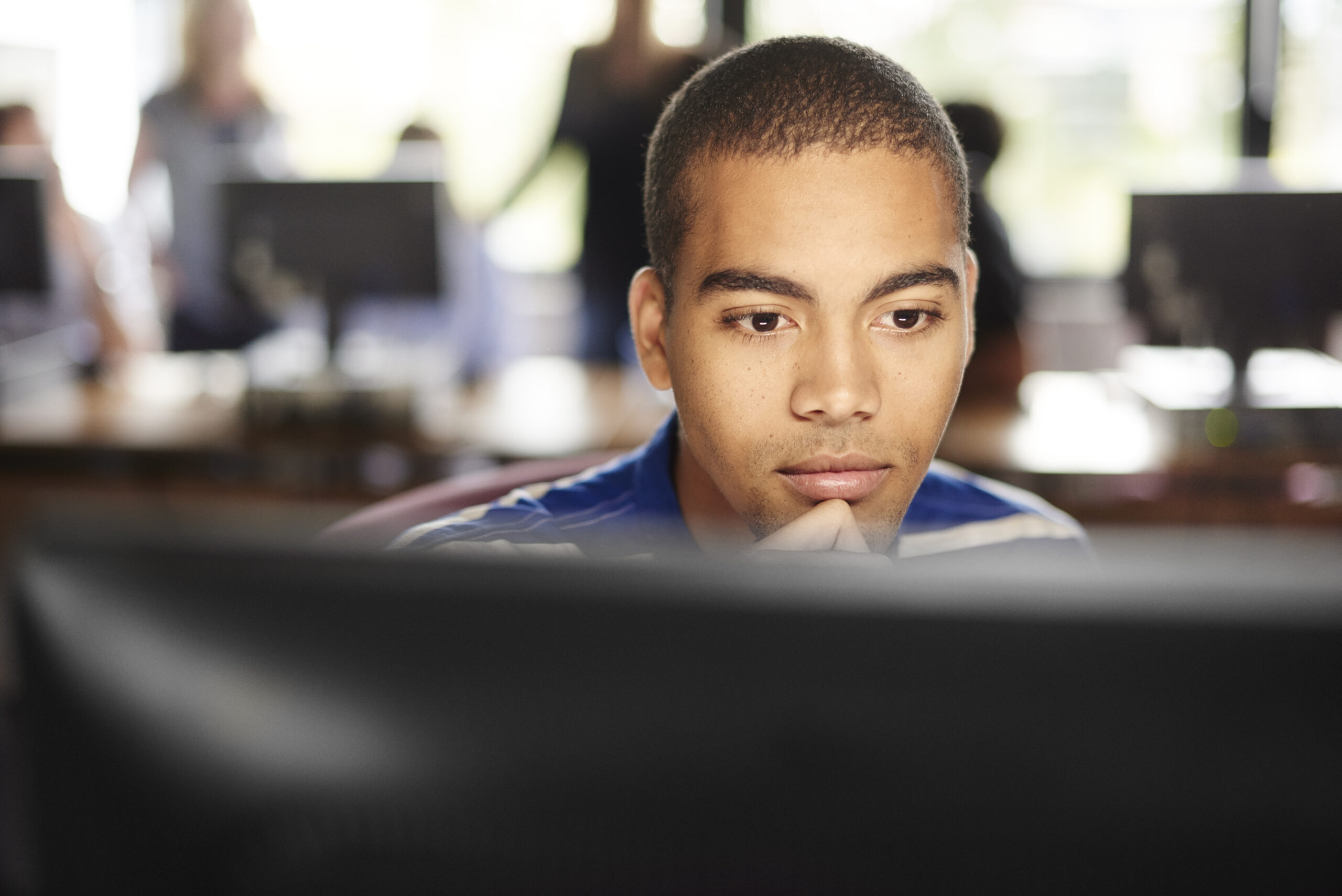 Student in classroom at the computer
